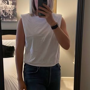 Aritzia’s Babaton Sleeveless Tee with Shoulder Pads.